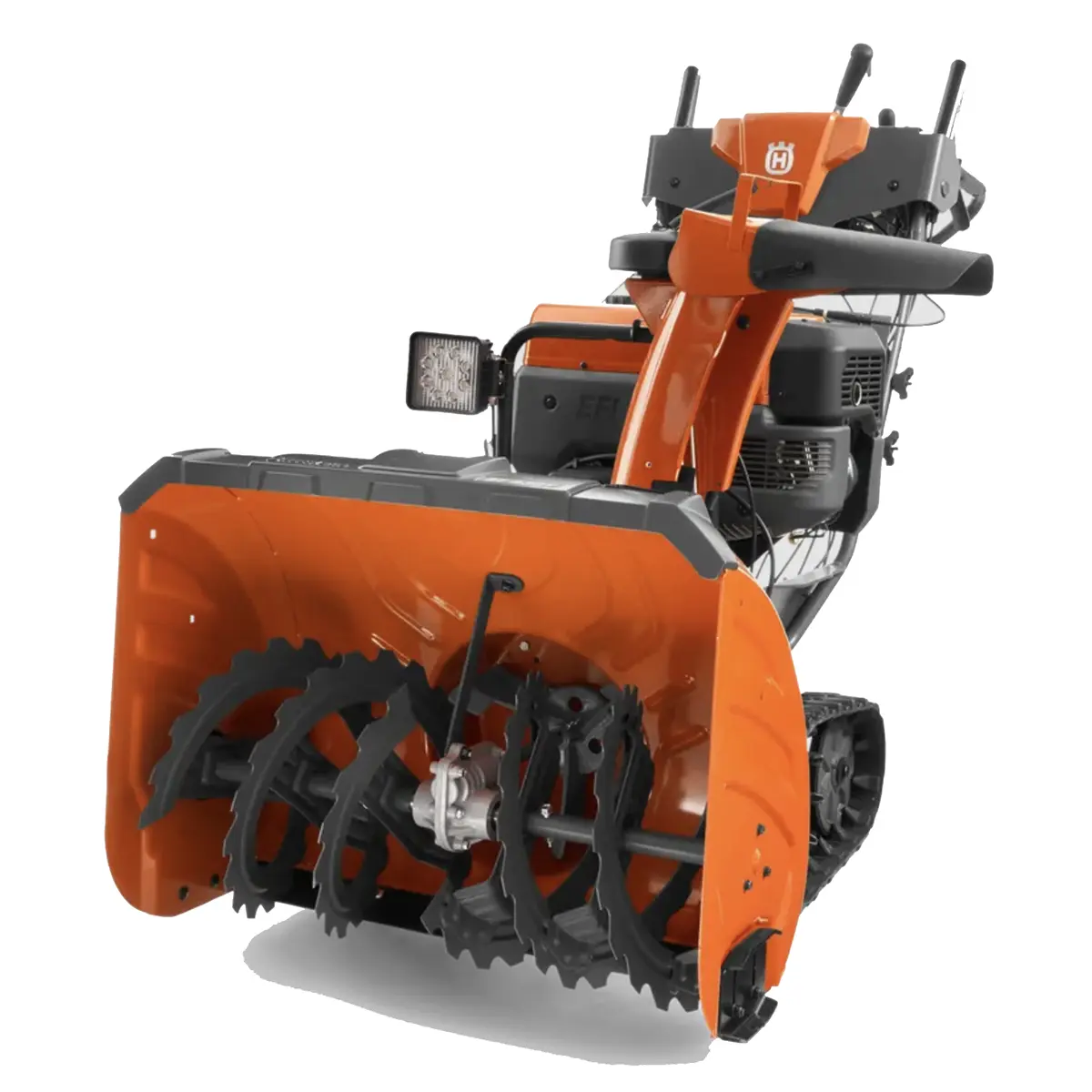 husqvarna-st-424t-snow-blower-with-track-drive-on-uneven-terrain.webp husqvarna st 424t snow blower